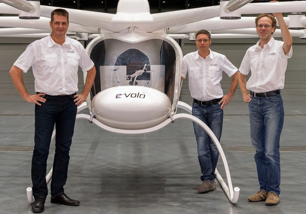 Some of the company design staff pose with the Evolo after its first flight.  Image Source: company website